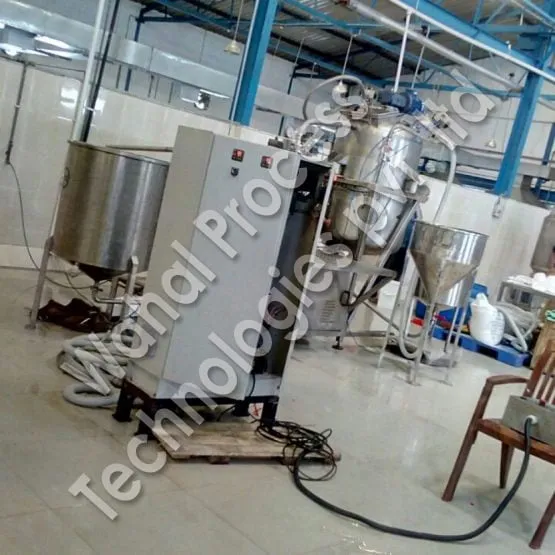 Wahal stainless steel process vessel with top-mounted agitator, control panel and conical feed hopper