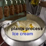 Chocolate-coated ice cream bars and syrup being added to ice cream mix in a stainless steel mixer
