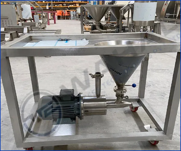 Wahal powder induction mixer with conical hopper and motor on a wheeled stainless steel frame