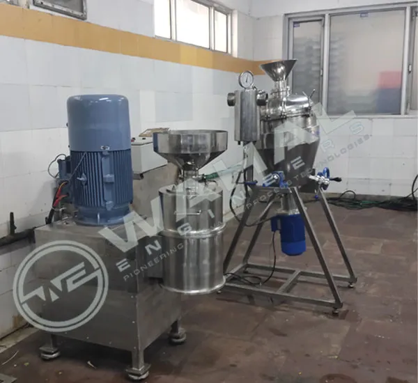 Wahal multiprocessor wet grinder with feed hopper beside a stainless steel vessel on a stand