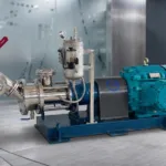 3D render of a solid-liquid powder induction mixer with teal motor, powder inlet hose and seal pot on a blue base